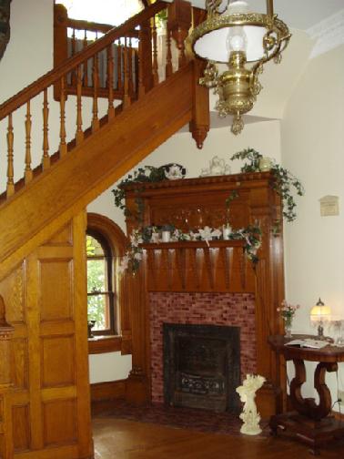 Original fireplace in foyer